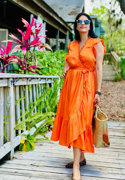 Front. Model wearing Frnch Summer orange dress