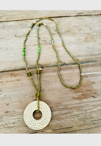 Hammered brass disc beaded long necklace